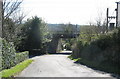 The road beneath the railway bridge to St Mary's Church in Llanfair Pwllgwyngyll Community