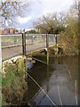 Footbridge across the River Test, Lower Test nature reserve in SO40 3QS