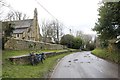 Road past the church in OX3 9UJ
