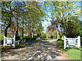 The entrance to Cuddington Way in KT17 3DH