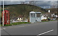 Phonebox, bus shelter and distant wind turbines, Gilfach Goch in CF39 8UF