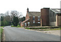 Dereham Lane past Home Farm at Crane's Corner in NR19 2HX