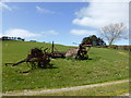 Old agricultural implements beside Glyndwr's Way in SY18 6NA