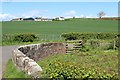 Minor road & bridge over Ladykirk Burn in KA6 5AT