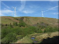 Wind turbines seen across Cwm Rhondda-fach in Maerdy Community