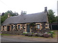A pair of semi-detached cottages by B937 in KY15 7UH