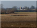 View across farmland to the village of Carlby in Carlby
