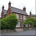 House on Ashby Road, with milestone in DE15 0AS
