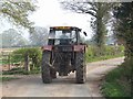 Tractor on the road from Shredicote Farm in ST18 9EB