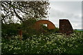 Derelict farm buildings near Withington in Withington