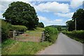 Field gate and road to Llanigon in HR3 5QF