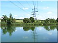 Pylon beyond Pallington Lakes in DT2 8QU