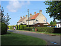 Houses in close off Holt Road in Field Dalling