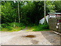 Footpath enters woodland on Chitty's Common in GU3 3JZ