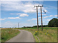 Electricity poles beside New Road in PE33 9FH