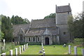 St Laurence's Church with gravestones in OX27 8TQ