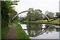 Footbridge opposite parkland, Paddington Arm, Grand Union Canal in UB4 9ST