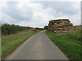 Logs by the lane from Shipton Oliffe in GL54 4HY