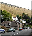 Houses and a hillside above Tylagwyn in CF32 8NY