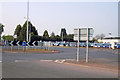 The Challock roundabout and Crossroads Motors in TN25 4AT