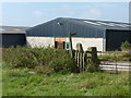 Gate and signpost by Sheldon House Farm Campsite Shower Block in ST13 7RH