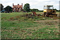 Farm machinery in front of Pasture Farm in MK44 3TD
