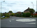 Mini roundabout at junction of Waverley Way and Nash Grove Lane in RG40 4PQ