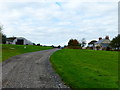 Footpath approaches buildings at New Barns Farm in PO17 6EW