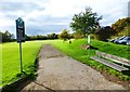 Bench and notice at entrance to Furzeley Golf Course in Furzeley Corner