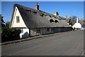Thatched cottages on the High Street in MK43 8SR
