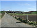 Farm road leading to Greenwards in AB42 0RG
