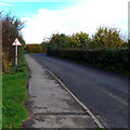 Bend ahead on Dunch Lane, Melksham in SN12 7QF