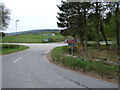 Road junction near Woodend in AB31 5ZE