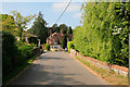 Entering Exton on Shoe Lane, with bridge over River Meon in SO32 3NA