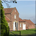 Former coach house or pigeoncote at Hall Farm in DN10 4PW