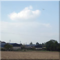 Farm buildings and field below the Birmingham Airport flightpath, Walsal End in B92 0AS