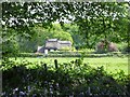 Thatched Cottage seen from Spearywell Wood in SO51 0AB