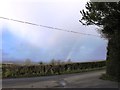 Road junction, rainbow in HR3 6JW