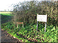 Signs beside the access road to Virginia Farm House in NR20 3DU