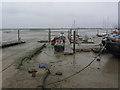 Boats in the mud, Lawling Creek, Maylandsea, Essex in CM3 6WP
