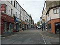 The lower part of the High Street viewed from the corner of Dean Street in LL57 1BY