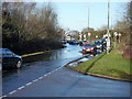 Flooded road, Pease Pottage in RH11 9GT