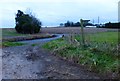 Footpath approaches road junction in SO32 3PY
