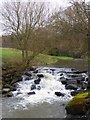 Weir on River Sid near Fortescue in EX10 9SN