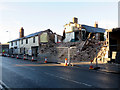 Collapsed buildings alongside Pen y Bryn, the A5152 in LL13 7QE
