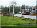 195 bus at Romney Road bus stop in UB10 9DE