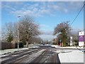Snowy Sandy Lane, looking north-west in CH3 6DU