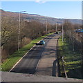 A4059 SE of a footbridge, Aberdare in CF44 6TT
