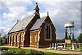 St Mary's Church and water tower in PE14 9RN