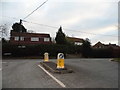 Updown Hill at the junction of Thorndown Lane in GU20 6QB